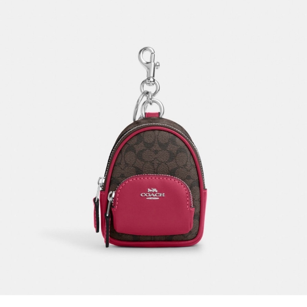 NWT COACH mini court backpack bag charm in
signature canvas.